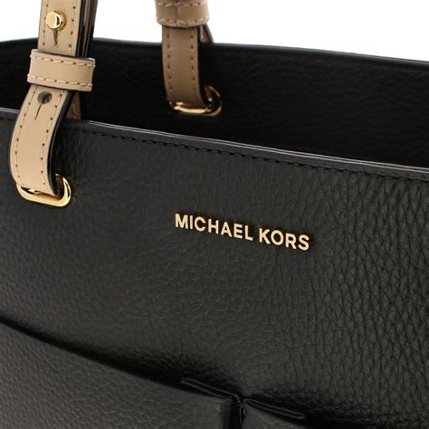 black micheal kors purse|michael kors black ribbed purses.